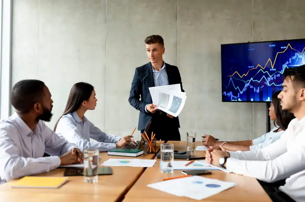 A business owner reviews quarterly planning with their team.